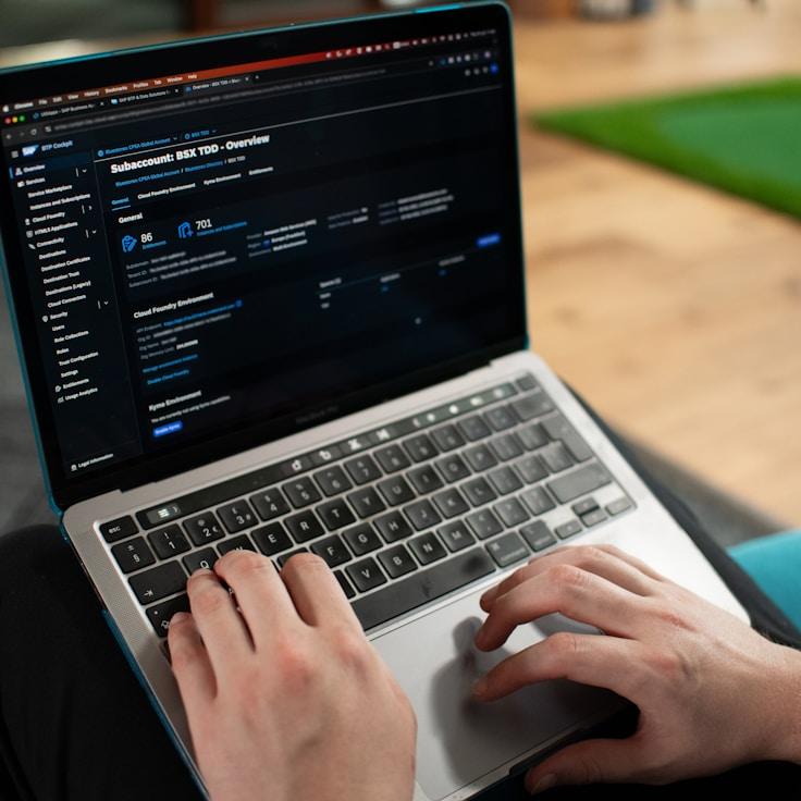Mobile app project planning workspace with devices and development tools